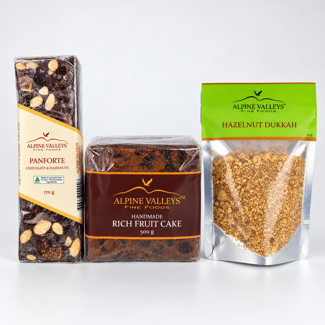 Alpine Valleys Fine Foods Gourmet Pantry Trio featuring handmade Rich Fruit Cake 500g, Chocolate Hazelnut Panforte 170g and Hazelnut Dukkah 70g.