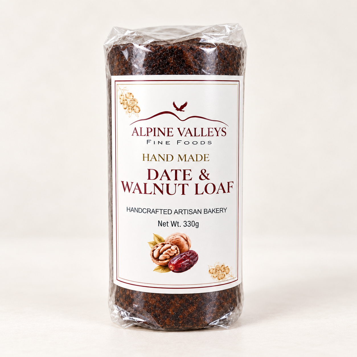 Alpine Valleys Fine Foods Handmade Date & Walnut Loaf 330g, a traditional Australian artisan cake made with dates and walnuts, presented in clear packaging with a branded label.