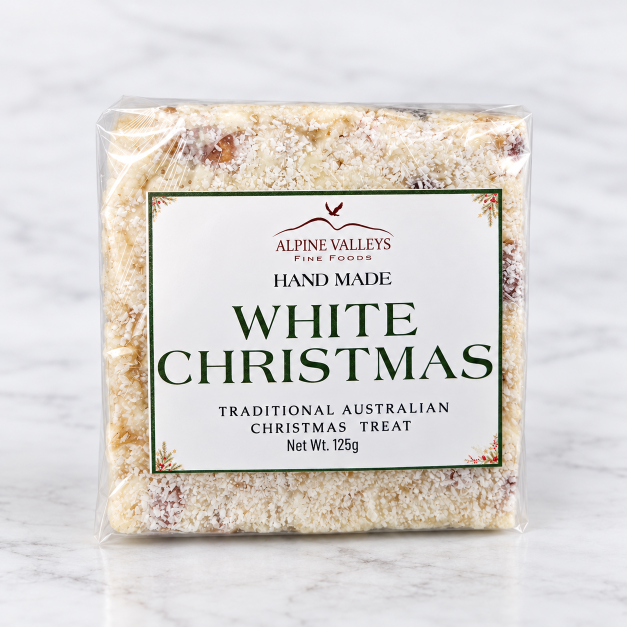 Alpine Valleys Fine Foods Handmade White Christmas 125g, a traditional Australian Christmas treat coated in coconut, presented in clear packaging with a festive label.