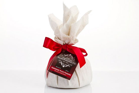 Traditional Christmas Plum Pudding 600 g – handmade festive pudding with brandy, vine fruits, almonds and spices. Serves 5, perfect for Christmas hampers.